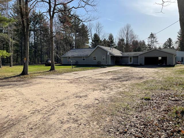 front view picture of 10560 N Tuttle Road, Free Soil, MI. 49411