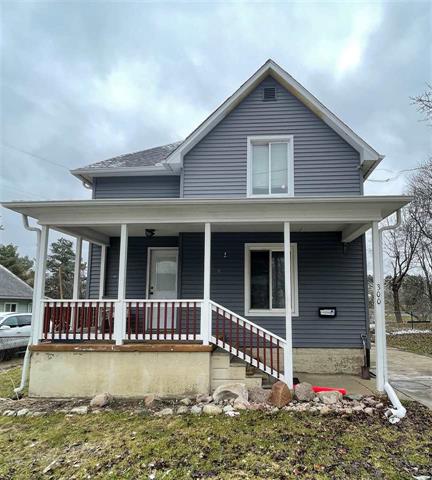 front view picture of 300 N Mill St, Clio, MI. 48420
