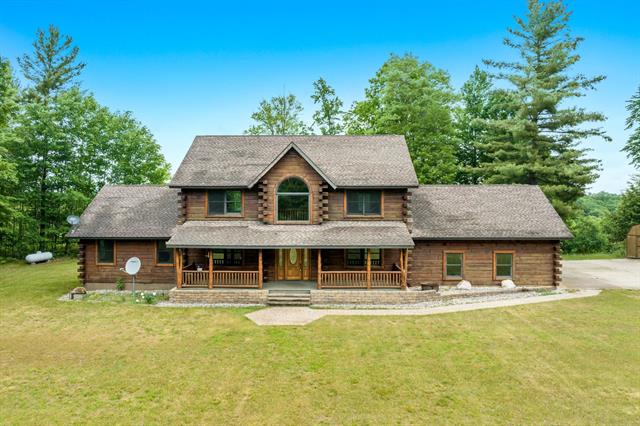 front view picture of 9644 Guenthardt Road, Manistee, MI. 49660