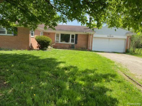 front view picture of 51815 8 Mile Road, Northville, MI. 48167