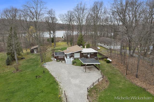 front view picture of 9065 Lincoln Lake Road Ne, Greenville, MI. 48838