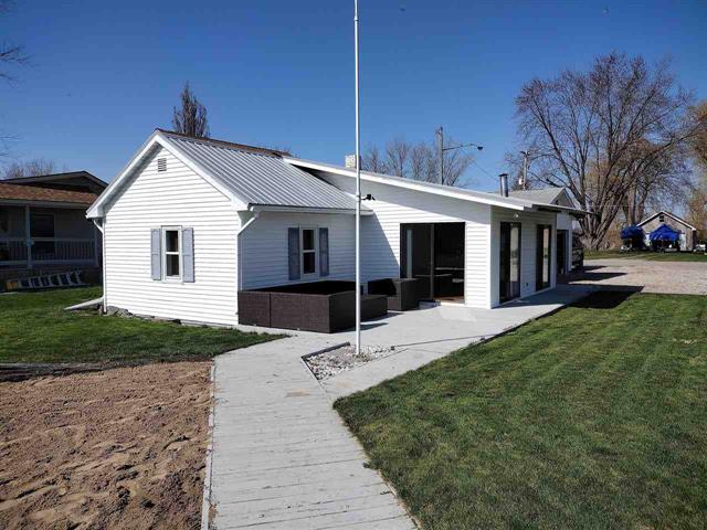 front view picture of 1878 Riverside Dr, Au Gres, MI. 48703