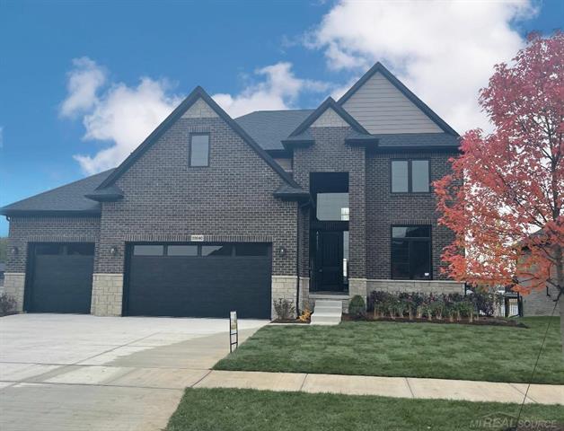 front view picture of 22040 Chaucer Court, Macomb, MI. 48044