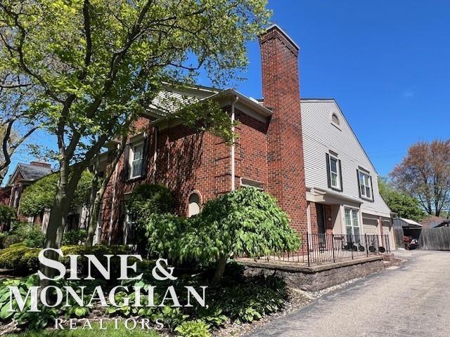 front view picture of 21957 Shore Pointe Lane, Saint Clair Shores, MI. 48080