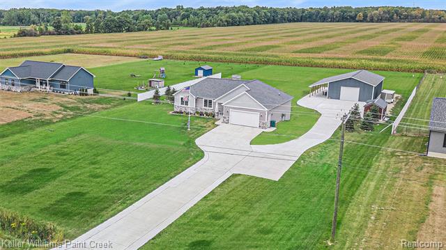 front view picture of 8309 Almont Road, Almont, MI. 48003