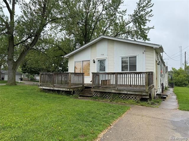 front view picture of 560 Mcmunn St, South Lyon, MI. 48178