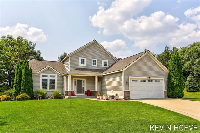 front view picture of 9355 Windward Drive, West Olive, MI. 49460