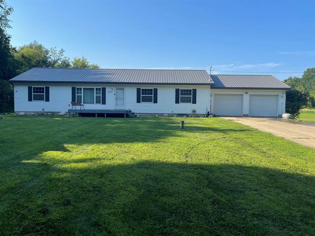 front view picture of 10556 Herring Road, Litchfield, MI. 49252