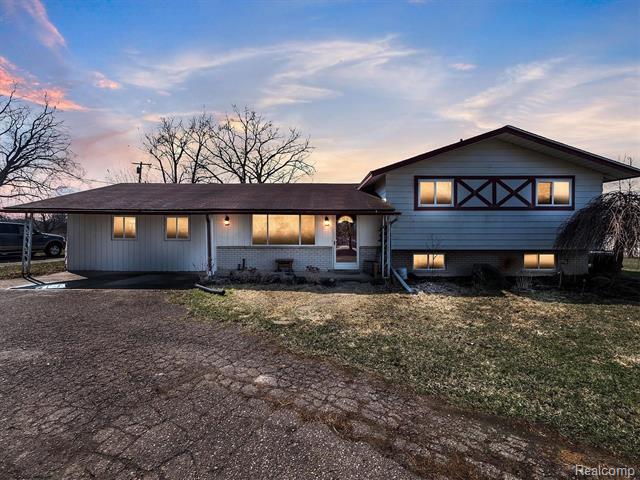 front view picture of 58191 8 Mile Road, Northville, MI. 48167