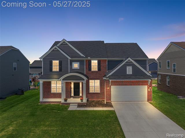 front view picture of 24603 Beach Drive, Macomb, MI. 48042