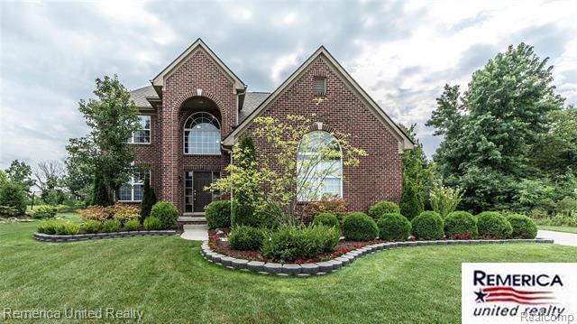 front view picture of 23640 Woodside Ct, South Lyon, MI. 48178