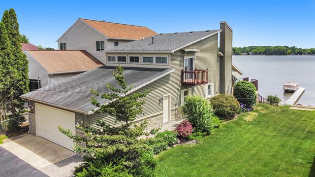 front view picture of 7076 Weller Drive Ne, Rockford, MI. 49341