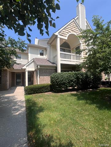 front view picture of 208 Oakbrooke Dr, South Lyon, MI. 48178