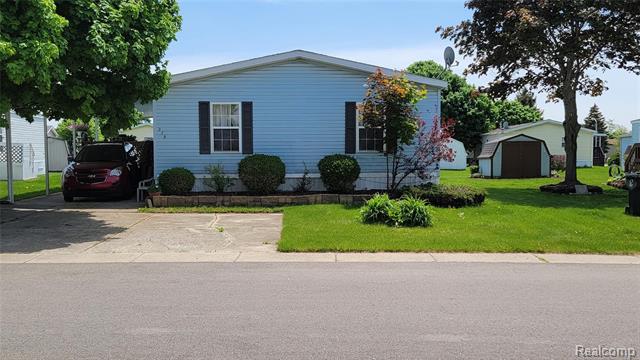 front view picture of 279 Jacqualyn Drive, Lapeer, MI. 48446