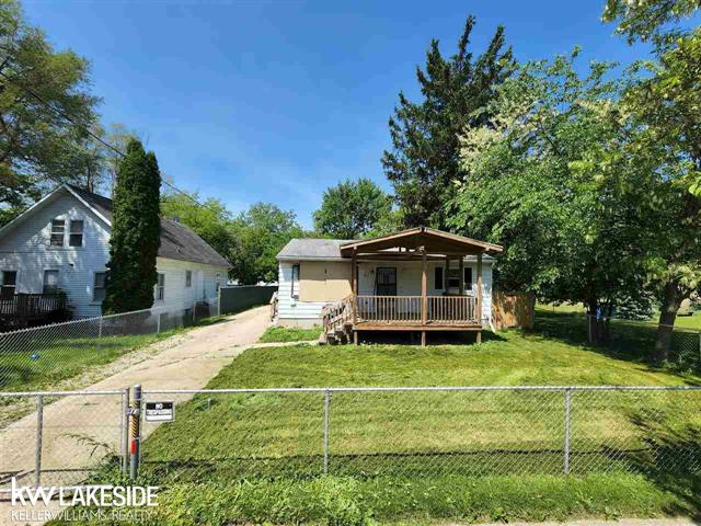 front view picture of 4912 Pleasant Grove Rd., Lansing, MI. 48910