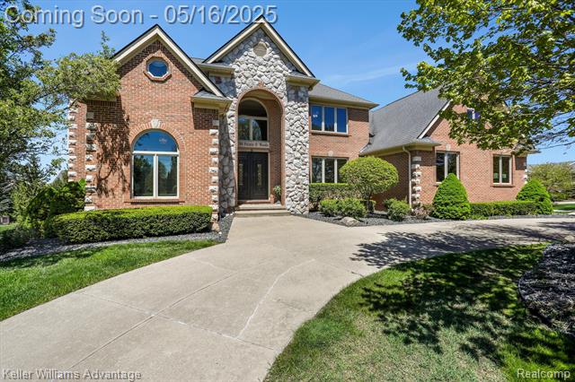 front view picture of 23790 Point O Woods Ct, South Lyon, MI. 48178