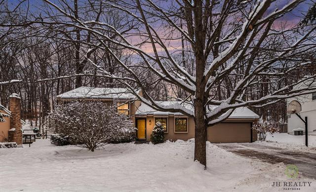 front view picture of 446 Adaway Avenue Se, Ada, MI. 49301