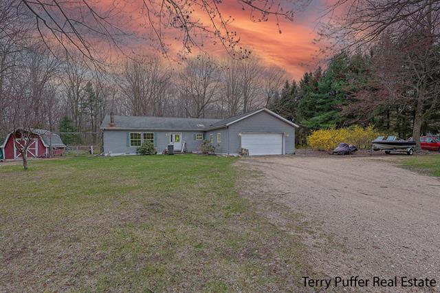 front view picture of 22 N Bossett Road, Ravenna, MI. 49451
