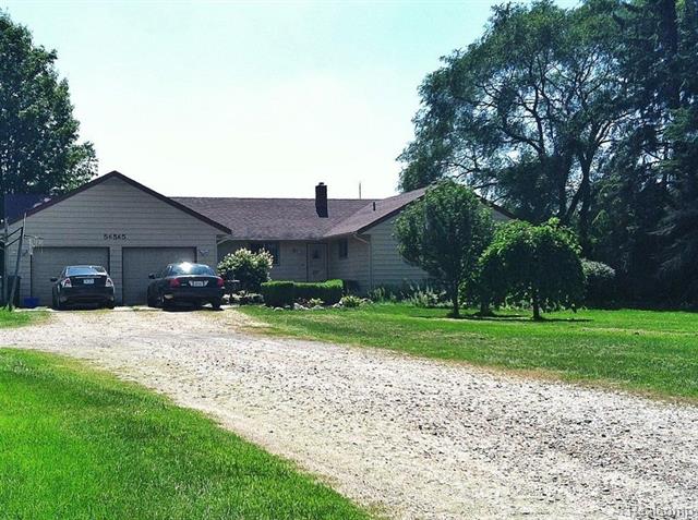 front view picture of 56565 10 Mile Rd, South Lyon, MI. 48178