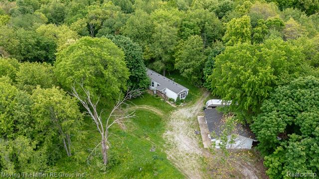 front view picture of 10531 Devils Lake Highway, Addison, MI. 49220