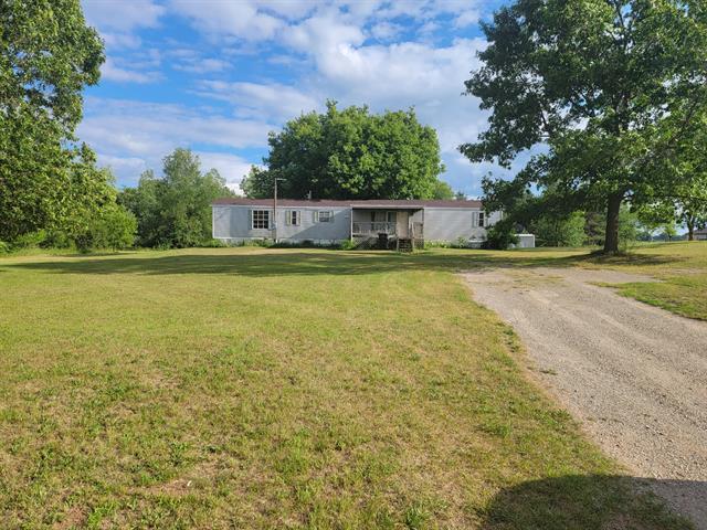 front view picture of 4925 Wheeler Road, Belding, MI. 48809