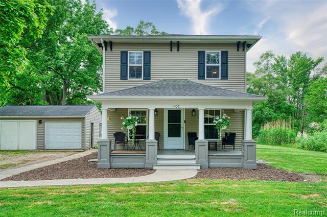 front view picture of 405 Garden Lane, Fowlerville, MI. 48836
