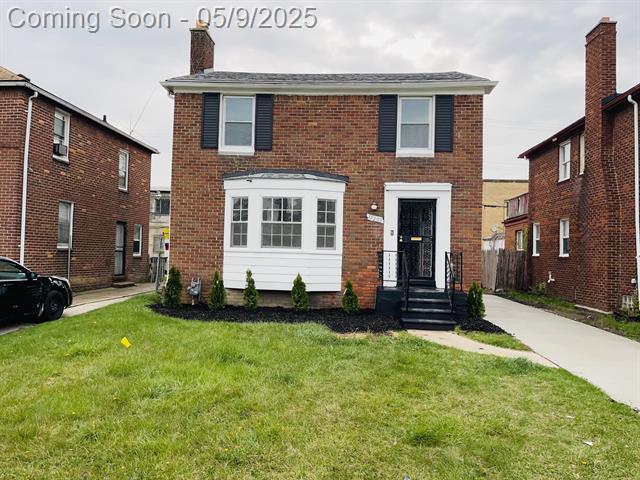 front view picture of 19209 Hartwell Avenue N, Detroit, MI. 48235
