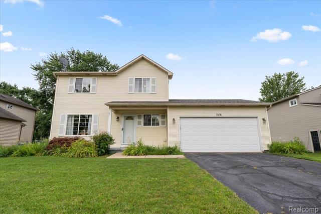 front view picture of 375 Eagle Way, South Lyon, MI. 48178