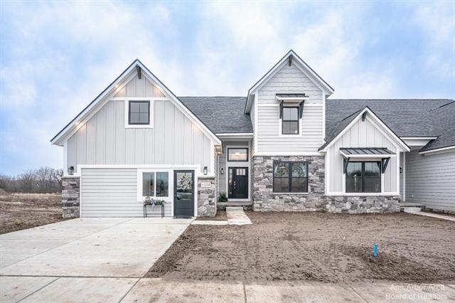 front view picture of 30 Black Cherry Lane, Saline, MI. 48176