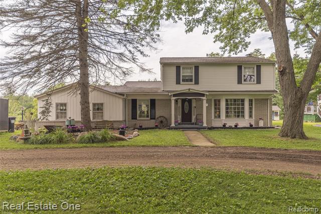 front view picture of 27395 Martindale Road, New Hudson, MI. 48165