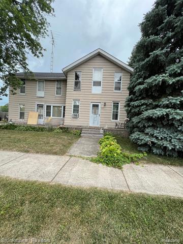 front view picture of 117 E Main Street, Otisville, MI. 48463