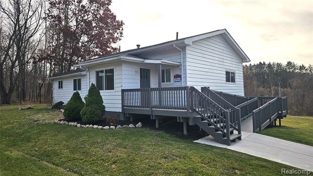 front view picture of 5080 Chilson Road, Howell, MI. 48843