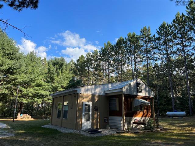 front view picture of 8210 N Johnson Road Road, Irons, MI. 49644