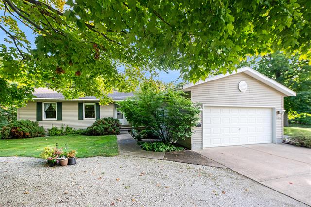 front view picture of 11970 Owens Road, Ravenna, MI. 49451