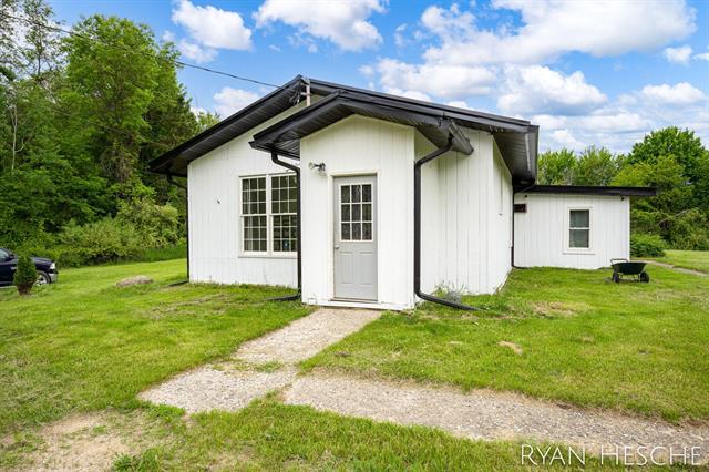 front view picture of 10340 Kartz Road, Greenville, MI. 48838