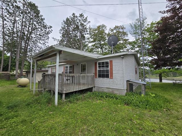 front view picture of 6063 Truman Road, Barryton, MI. 49305