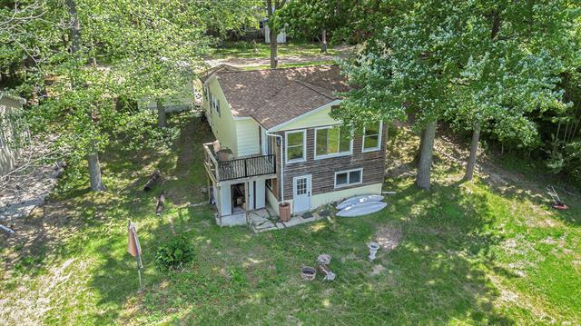 front view picture of 4595 Hunters Trail, Six Lakes, MI. 48886