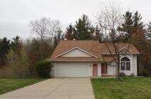 front view picture of 733 Riverhills Court, Newaygo, MI. 49337