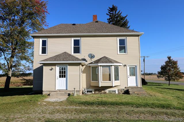 front view picture of 142 S Van Dyke Road, Marlette, MI. 48453