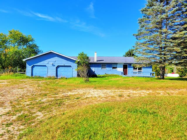 front view picture of 8787 95Th Avenue, Evart, MI. 49631