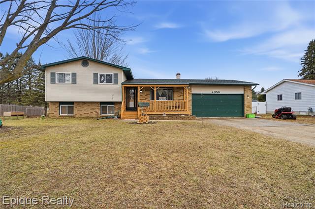 front view picture of 4056 Field Rd, Clio, MI. 48420