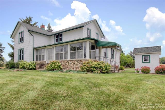 front view picture of 9476 W Michigan Avenue, Saline, MI. 48176