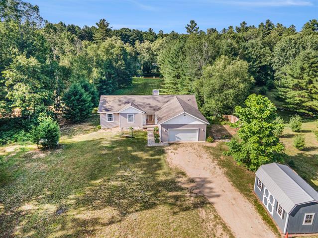 front view picture of 8420 N Echo Valley, Irons, MI. 49644