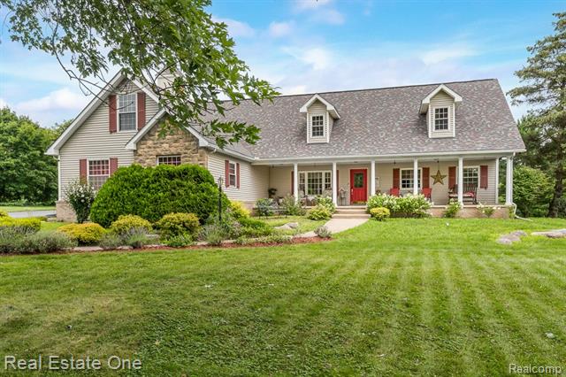 front view picture of 58900 12 Mile Rd, New Hudson, MI. 48165
