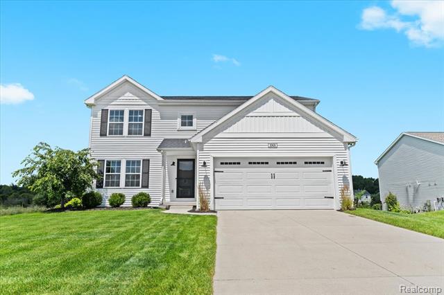 front view picture of 1068 Weatherstone Lane, Howell, MI. 48843