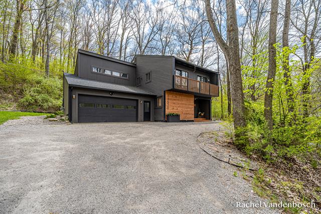 front view picture of 11520 Grand River Drive Se, Lowell, MI. 49331