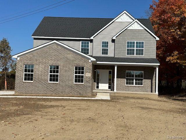 front view picture of 59532 8 Mile, South Lyon, MI. 48178