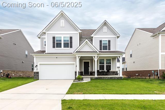 front view picture of 737 Haywood Drive, Saline, MI. 48176
