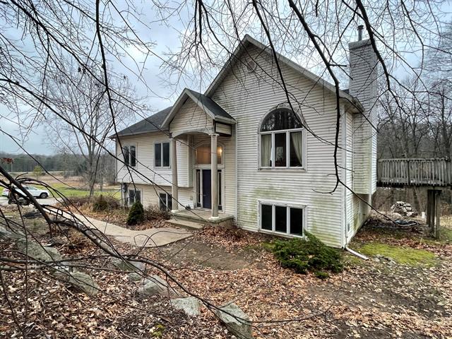 front view picture of 12700 Mcpherson Street Ne, Lowell, MI. 49331