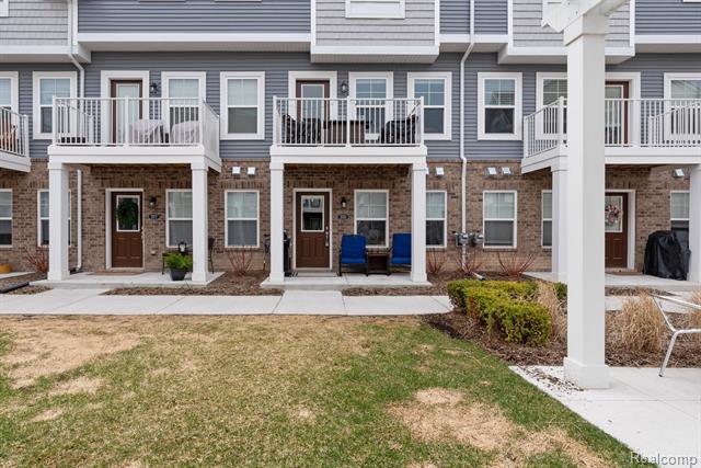 front view picture of 203 Sean Street, Brighton, MI. 48116